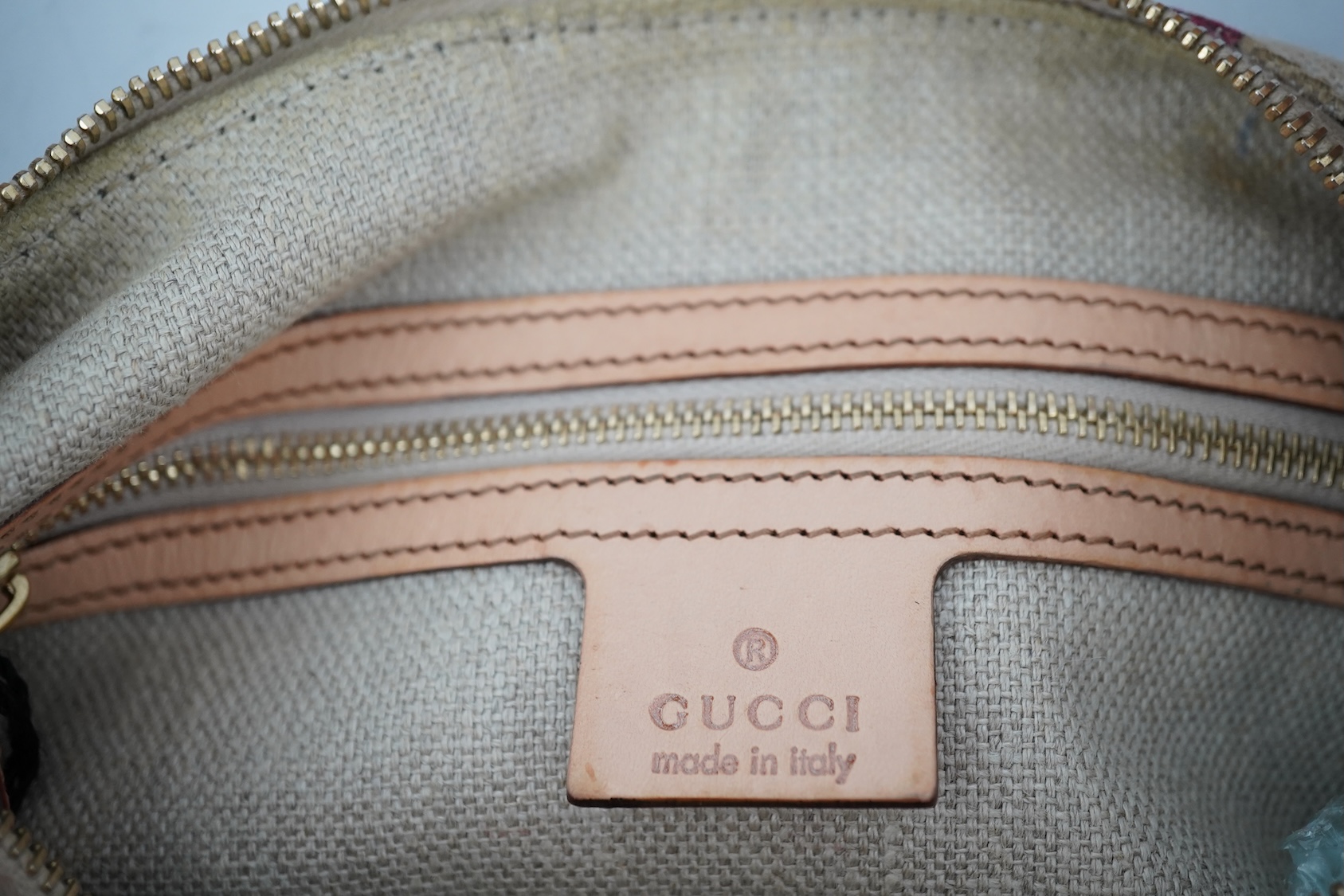 A Gucci flora canvas horse-bit hobo bag with dust bag